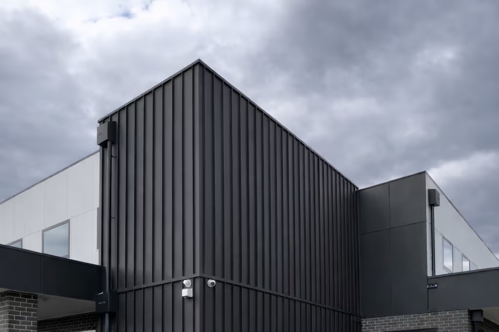 Black standing-seam cladding on Explorers Childcare, Essendon